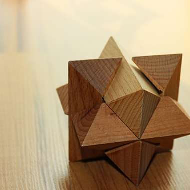 Wooden geometric shape on wood table