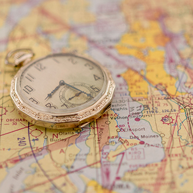 Pocket watch on air navigation chart