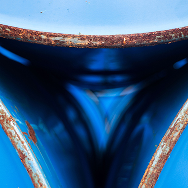 Close up stack of oil barrels