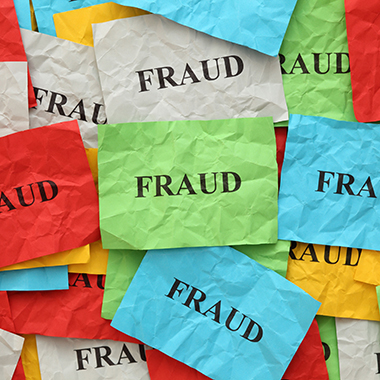 Colorful notes with fraud printed