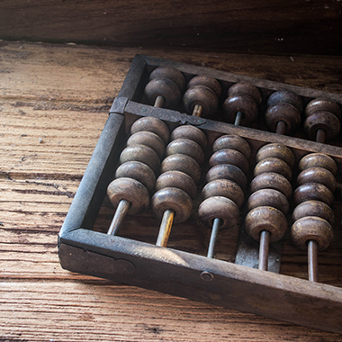 Wooden abacus on wood floor