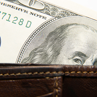 Dollar Bills in Wallet