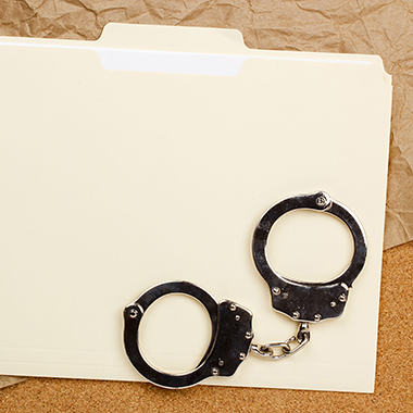 Handcuffs on File Folder