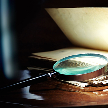 Open Book & Magnifying Glass