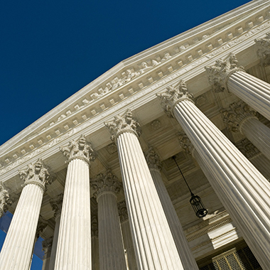 Front Exterior of US Supreme Court Against Sky