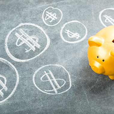 Piggy Bank and $ on Chalkboard