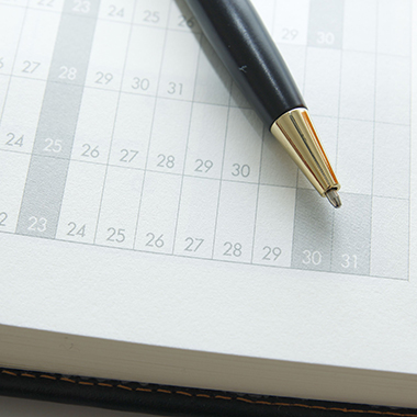 End of year calendar and pen