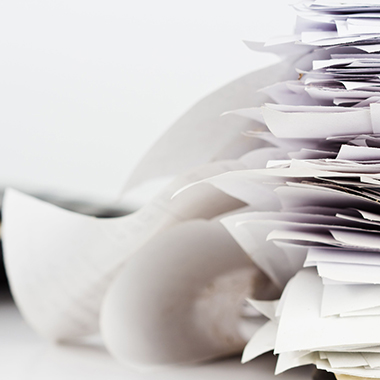 Stack of Receipts or Bills on Business Desk