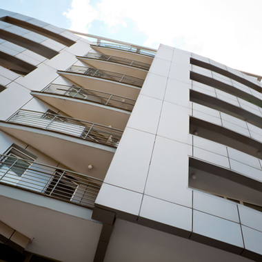 View From Below of Building with Balconies