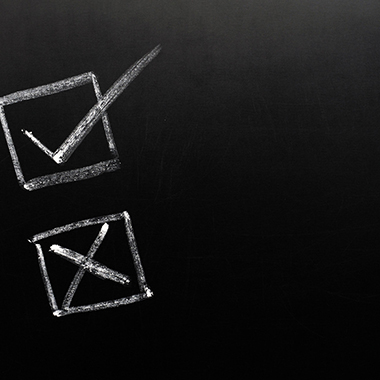 Checklist Boxes with Tick and Cross on Chalkboard