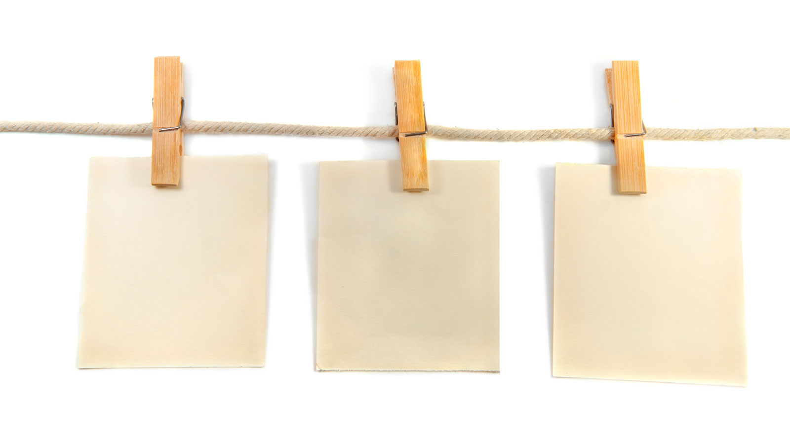 wooden clip and note isolated on white background