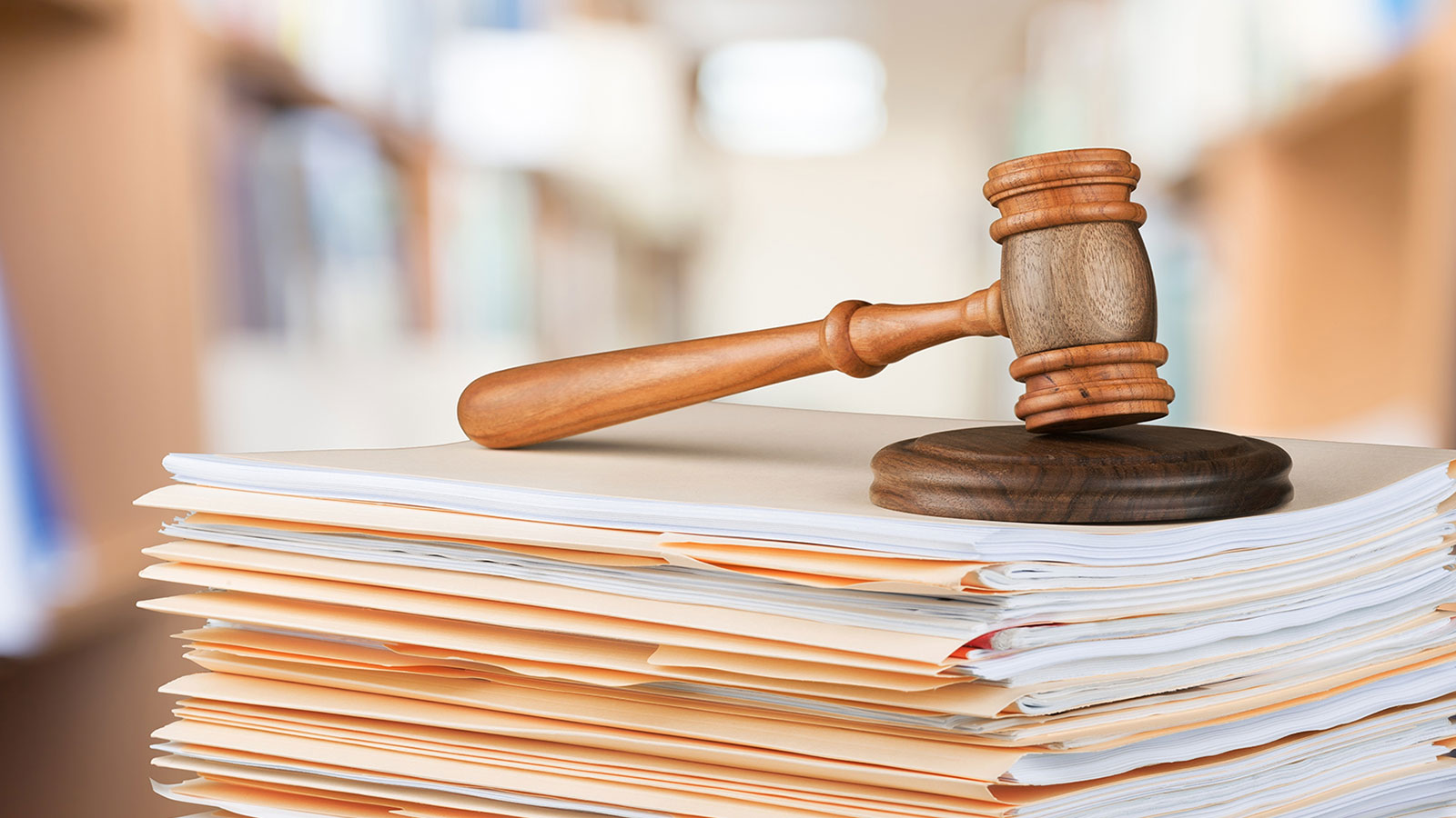 Gavel on top of stacked files