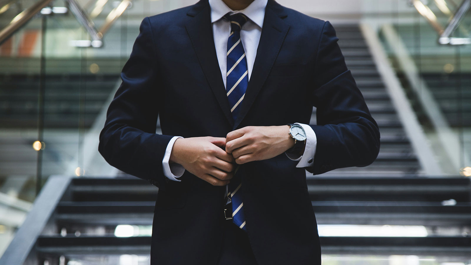 Man adjusting his suit