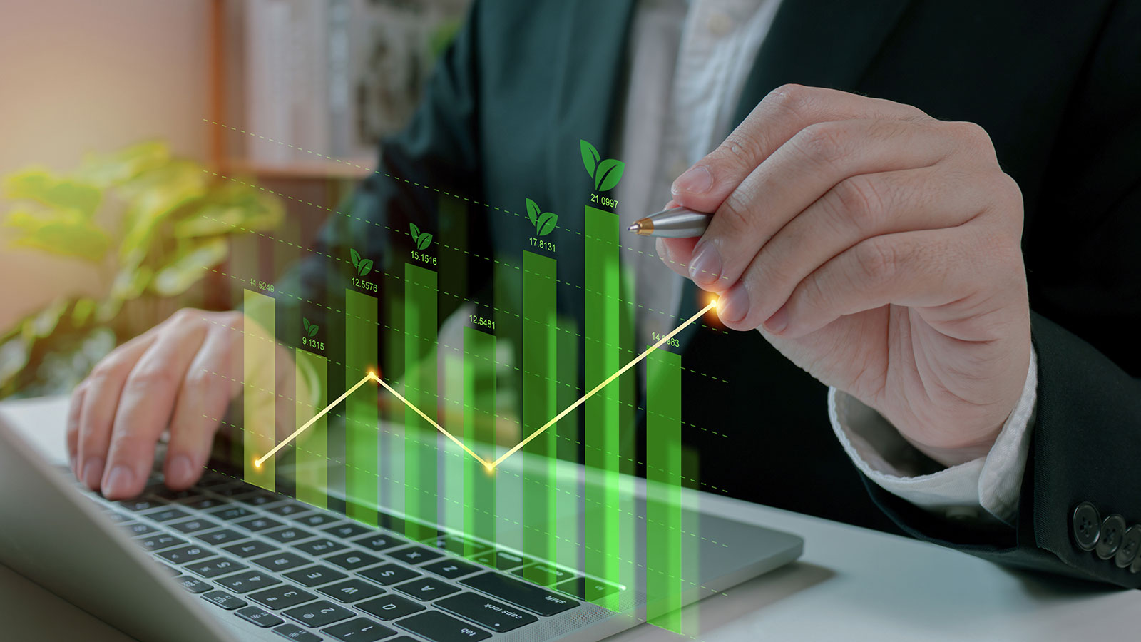 Businessman use laptop analyzing sustainability company growth with digital virtual graphics
