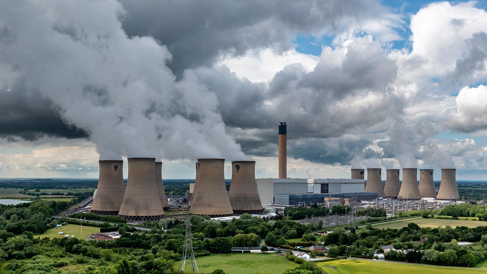 Aerial landscape view of a large Coal Fired Power Station with pollution emissions