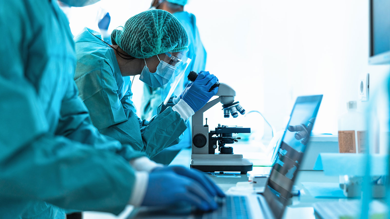 Medical workers doing analysis in laboratory