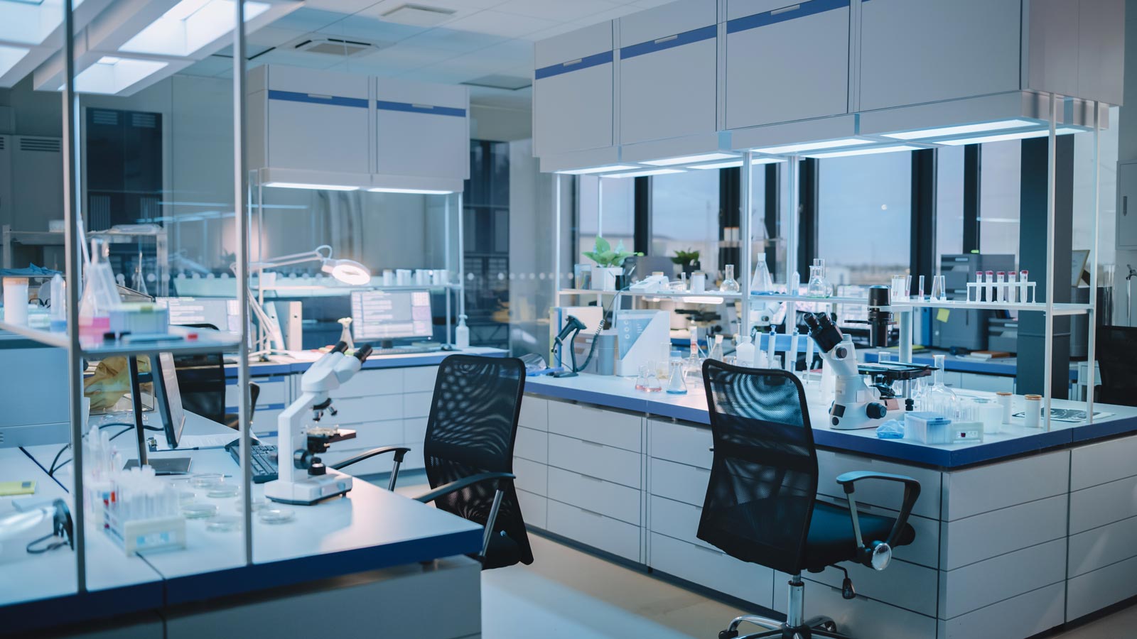 Modern Empty Biological Applied Science Laboratory with Technological Microscopes, Glass Test Tubes
