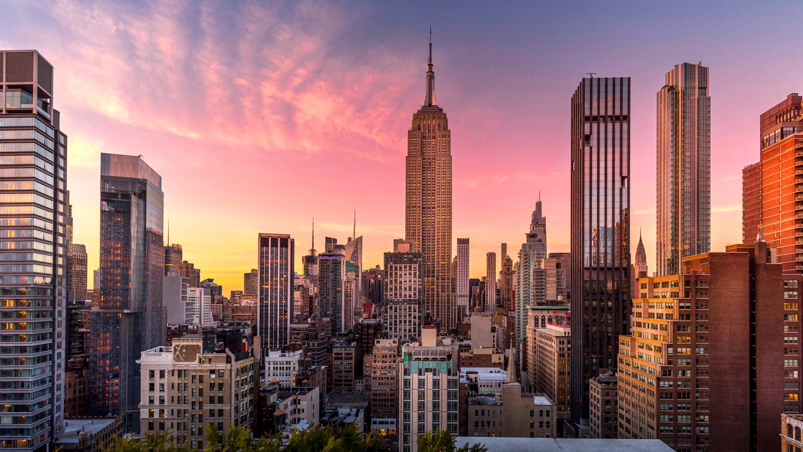 New York skyline at the end of sunset with Empire State Building in foreground