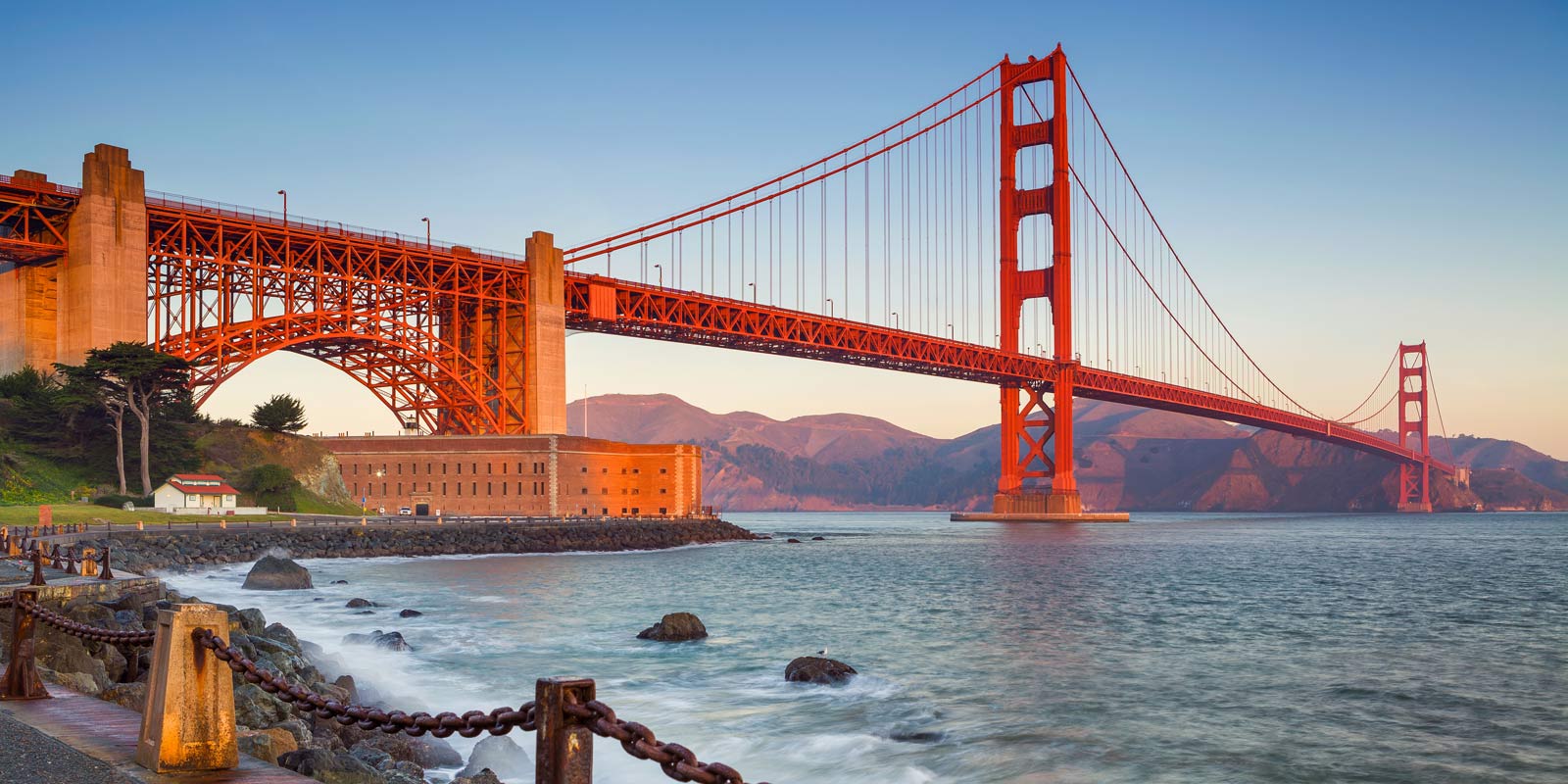 San Francisco. Image of Golden Gate Bridge in San Francisco, California during sunrise.
