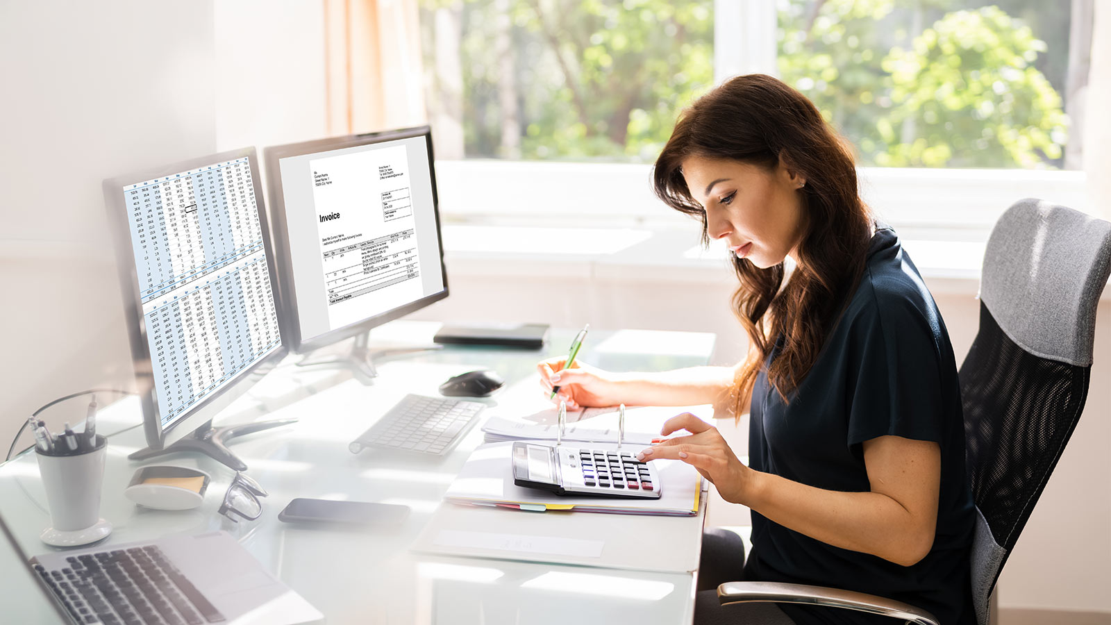 Accountant Using E Invoice Software At Computer