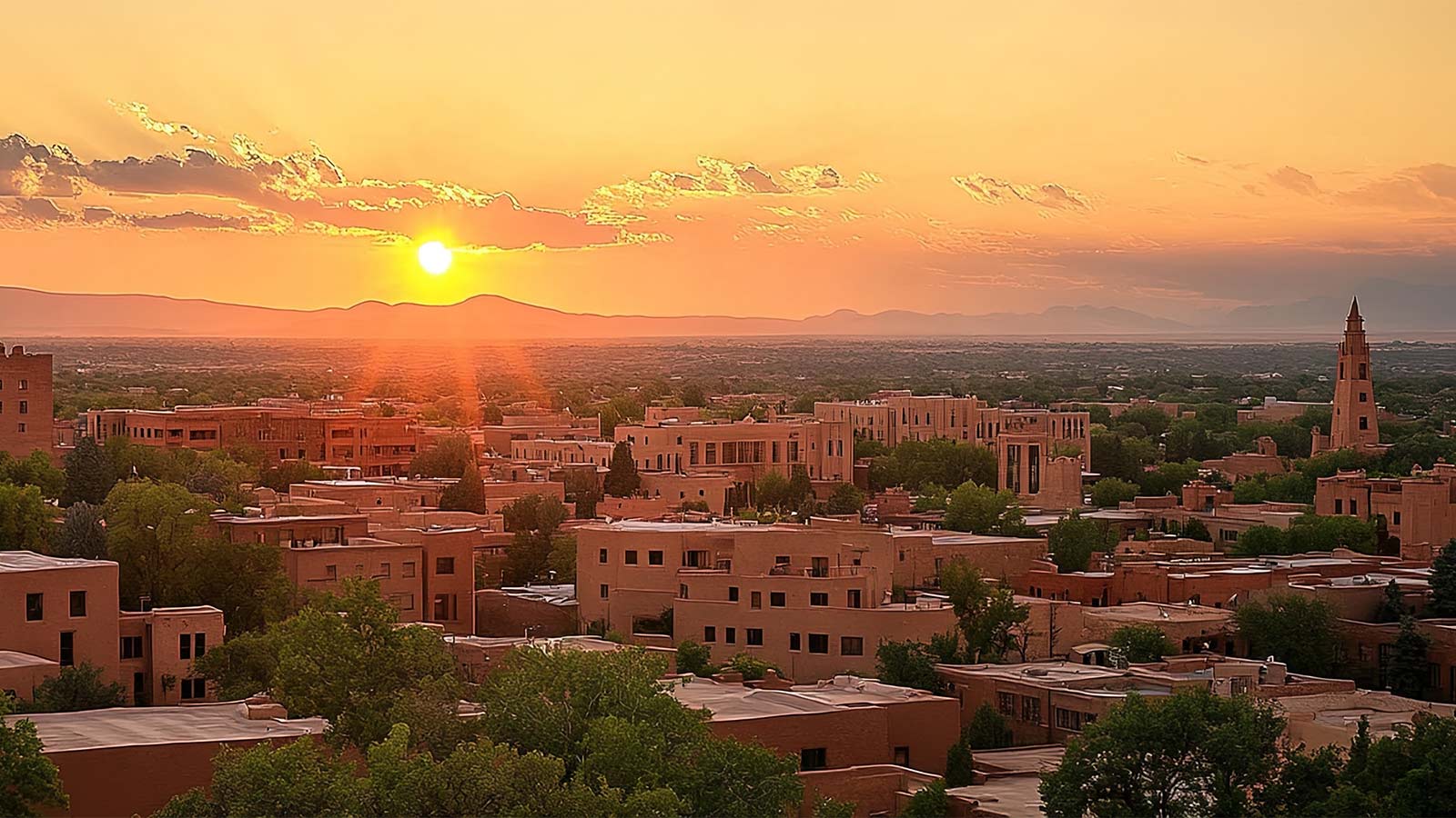 City of santa fe new mexico, traditional pueblo and spaniard architecture, skyline of city, sunset